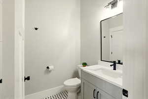 Bathroom featuring vanity and tile patterned flooring