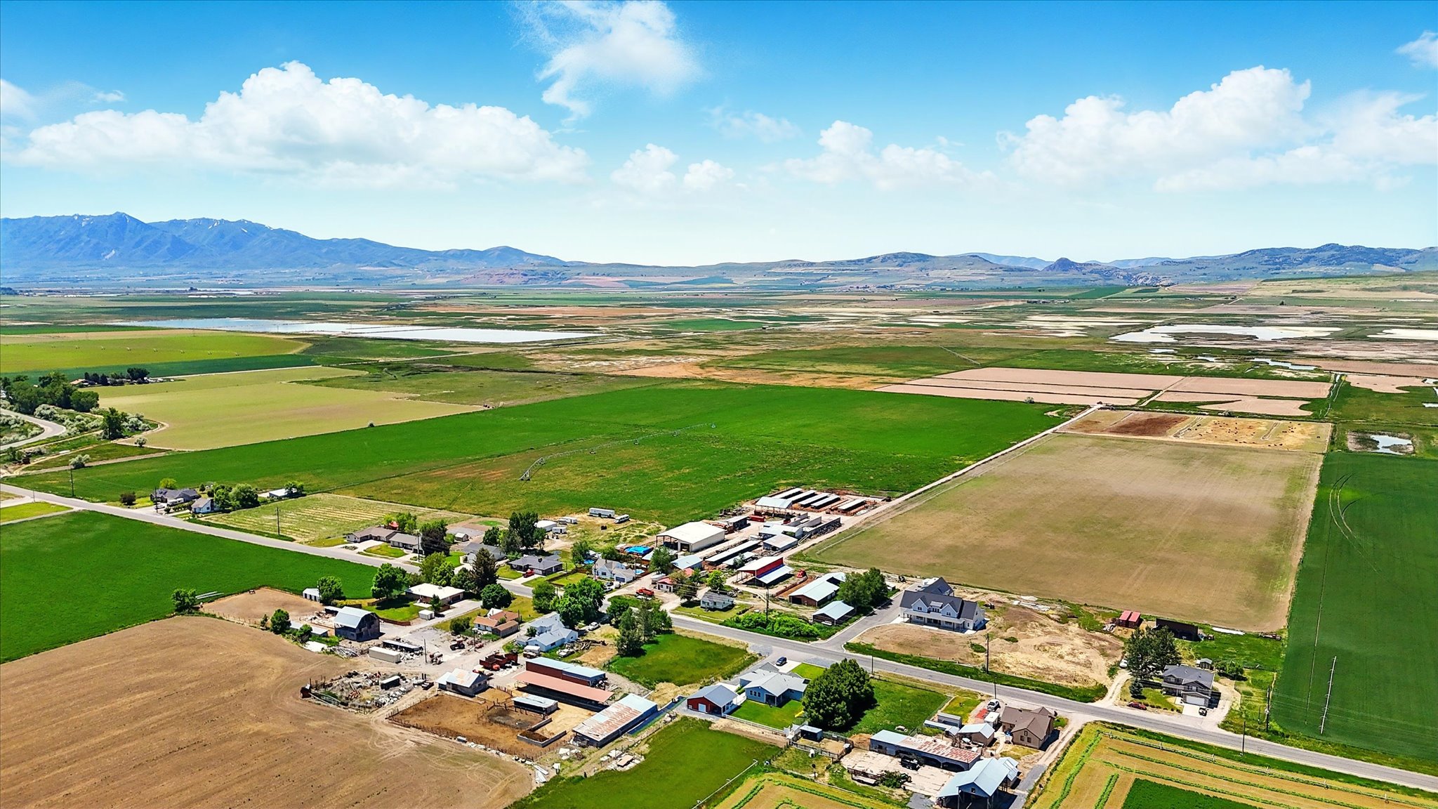 Overview of rural landscape with a water and mountain view