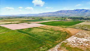 View of farmland with mountain background