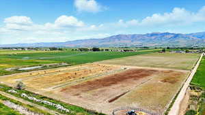 View of mountain backdrop featuring rural landscape