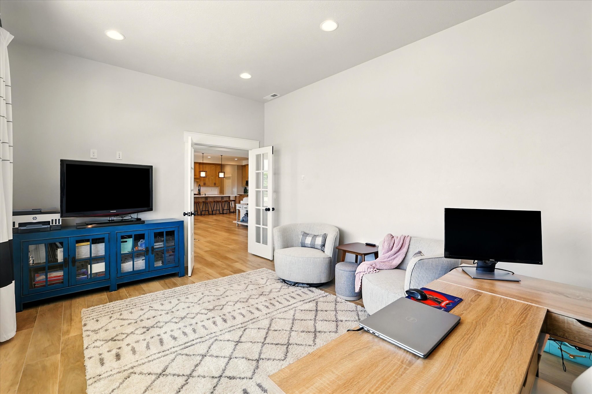 Office featuring recessed lighting, light wood-type flooring, and french doors