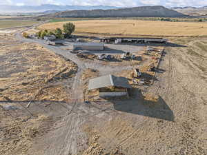 Overview of rural landscape featuring a mountain backdrop