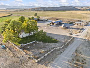 Aerial view of sparsely populated area featuring a mountainous background