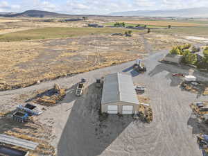 Overview of rural landscape with a mountain backdrop