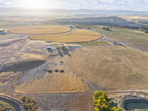 Aerial overview of property's location featuring mountains and rural landscape