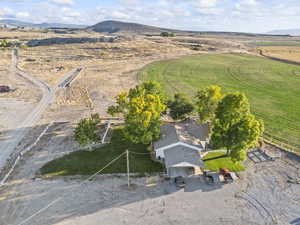 Overview of rural landscape with a mountain backdrop