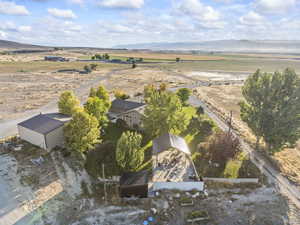 View of property location featuring a mountainous background and rural landscape