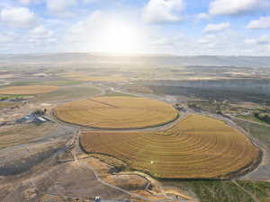 Aerial view of property's location featuring mountains and rural landscape