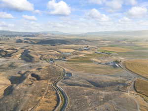 View of property location featuring rural landscape and a mountain backdrop