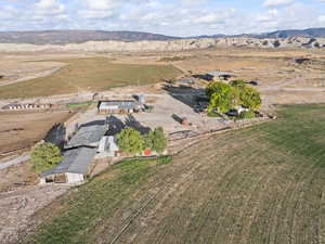 Aerial view of property's location featuring rural landscape and a mountain backdrop