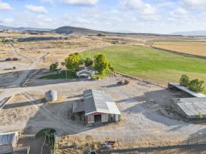 Aerial view of sparsely populated area with a mountainous background