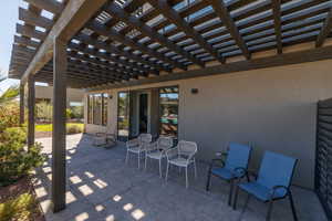 View of patio with a pergola