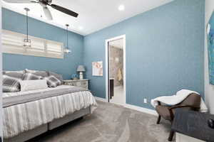 Bedroom featuring carpet, ceiling fan, recessed lighting, and wallpapered walls