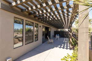 View of patio featuring a pergola