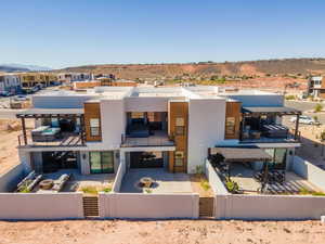 View of property featuring a fenced front yard and a mountain view
