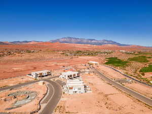 Drone / aerial view of a mountain backdrop and a desert landscape