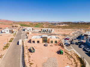 View from above of property with a mountain backdrop