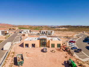 View from above of property featuring a mountainous background