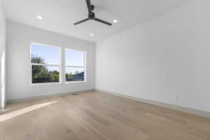 Unfurnished room with recessed lighting, light wood-style floors, and a ceiling fan