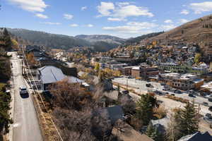 Aerial perspective of suburban area featuring mountains