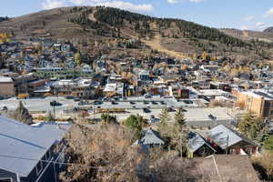 Aerial view of residential area with mountains