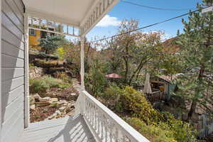 View of wooden balcony featuring a wooden deck