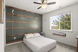 Bedroom with carpet floors and ceiling fan