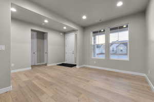 Foyer entrance featuring recessed lighting and light wood-style flooring