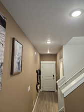Entry way featuring 9 foot ceiling and light tone welcoming paint color