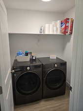 Laundry room with front loading washer and dryer - included in sale