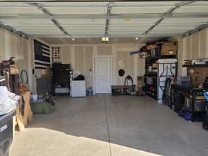 Garage featuring a garage door opener