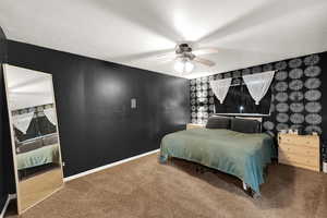 Bedroom featuring carpet and ceiling fan