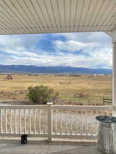 View of yard with a view of rural / pastoral area and a mountain view