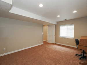 Unfurnished office with carpet and recessed lighting