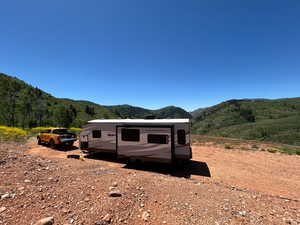 View of property exterior featuring a mountain view