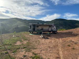 Back of property featuring a mountain view