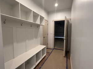 Mudroom featuring baseboards