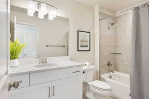 Full bath with shower / bath combo and vanity