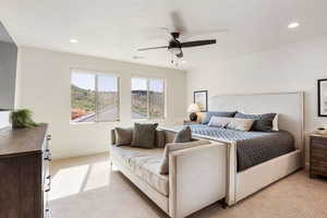 Bedroom featuring light carpet, a ceiling fan, recessed lighting, and a textured ceiling