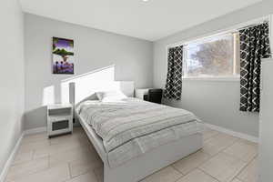 Bedroom with baseboards