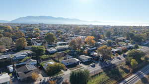 View of property location featuring a mountain backdrop and nearby suburban area