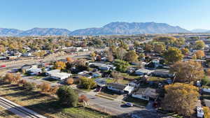 Aerial view of residential area with a mountainous background