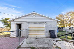 Garage featuring driveway