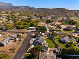 Aerial perspective of suburban area with mountains