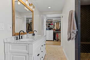 Spacious closet featuring a sink