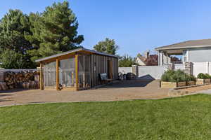 Exterior space featuring exterior structure and an outbuilding