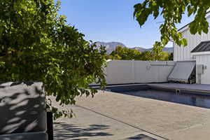 View of patio / terrace with a mountain view