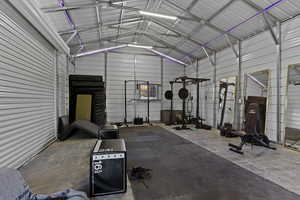 Garage featuring metal wall