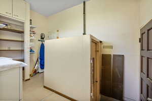 Bathroom featuring baseboards