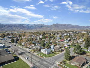 Aerial view of residential area featuring a mountain backdrop